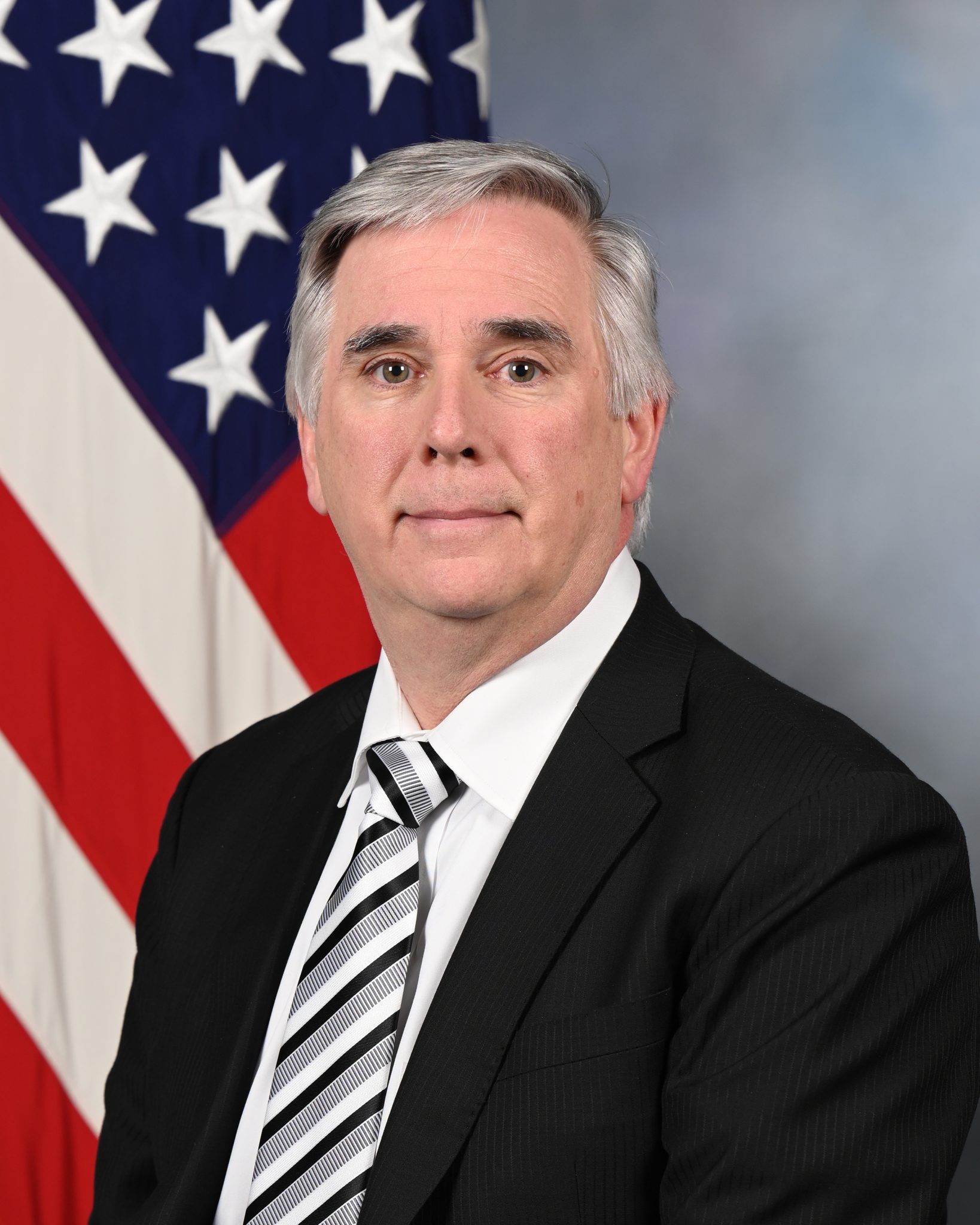 Mr. Thomas Simms poses for his official portrait in the Army portrait studio at the Pentagon in Arlington, Va., Jan. 24, 2023.  (U.S. Army photo by William Pratt)